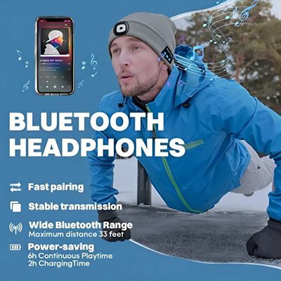Le chapeau d'écouteurs de Bluetooth de sports remet librement avec des entretiens Flahslight de téléphone de musique